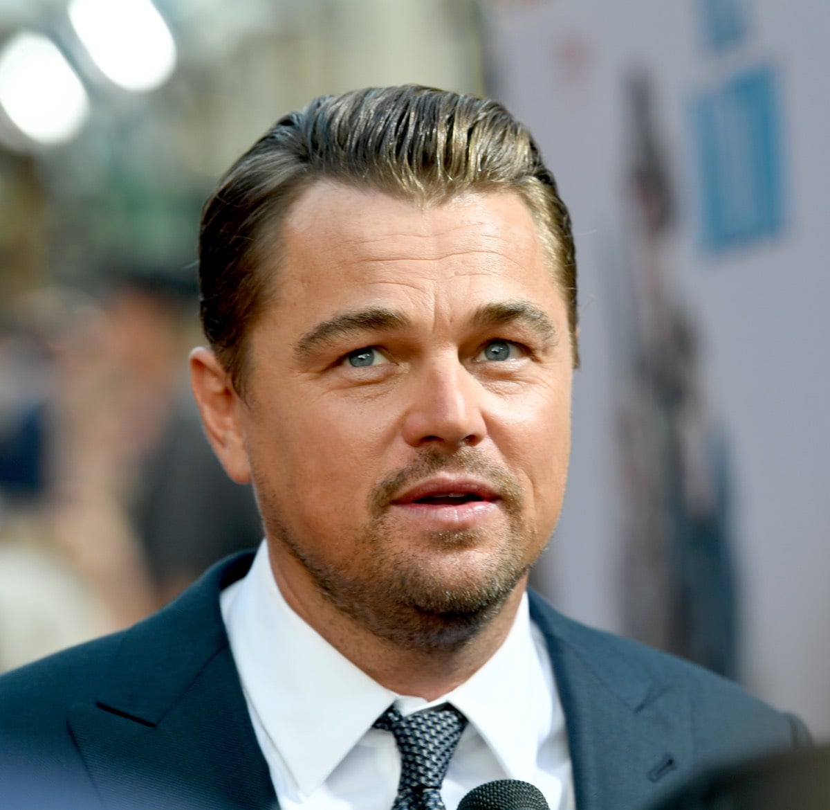 Brad Pitt Leonardo DiCaprio Margot Robbie Shine at Once Upon a Time