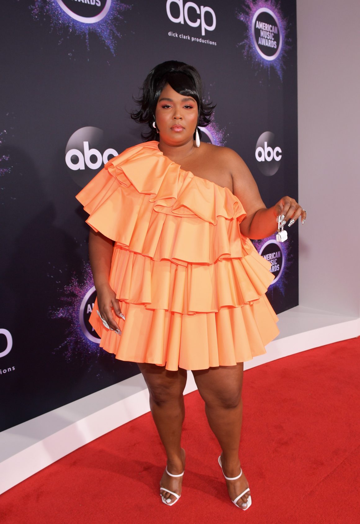 Lizzo Wore the World's Tiniest Handbag to the American Music Awards