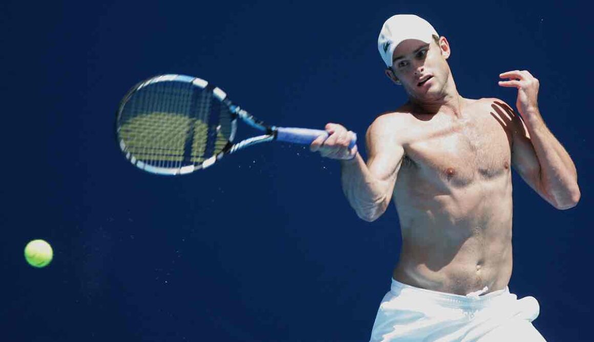 Andy Roddick of the USA smashes the felt - Socialite Life