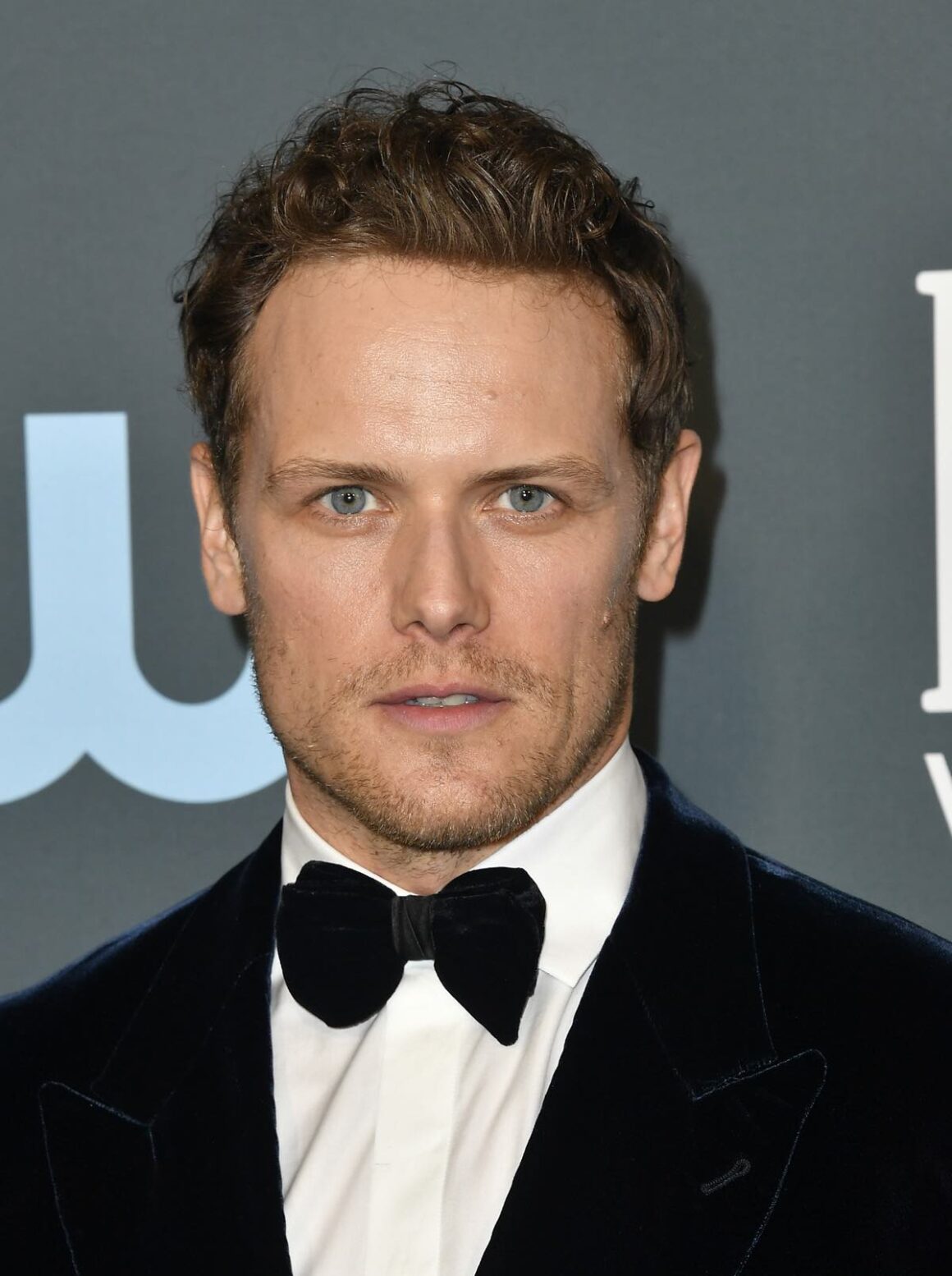 Sam Heughan Is Still Definitely Ready and Willing to Play James Bond ...