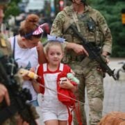 Police arrest suspect after gunman kills six at US July 4 parade