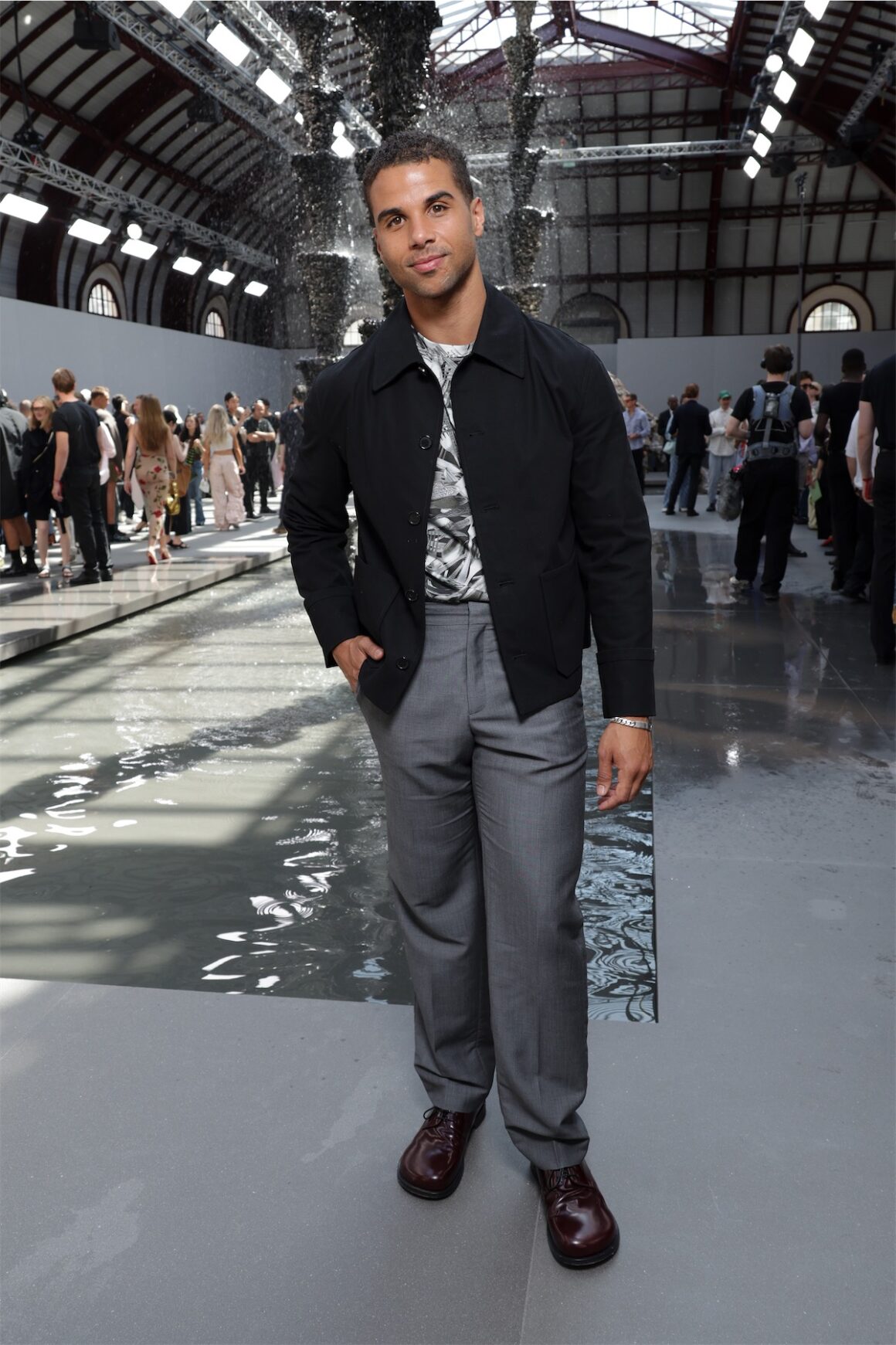 Pharrell Williams takes a victory lap at the Loewe show in Paris