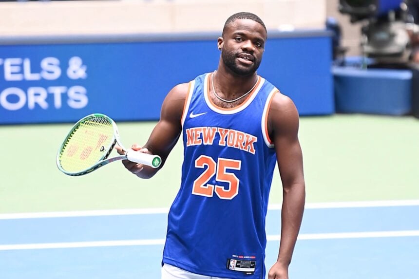 Frances Tiafoe Practicing In A New York Knicks Jersey