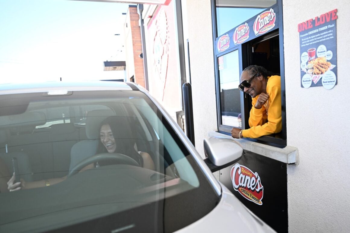 Snoop Dogg Works Surprise "Shift" at Raising Cane's in Vegas Ahead of National Chicken Finger Day on July 27