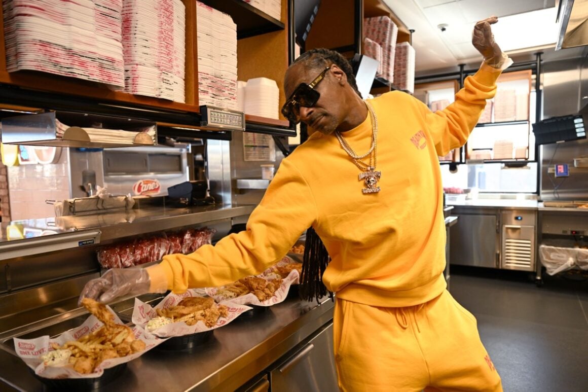 Snoop Dogg Works Surprise "Shift" at Raising Cane's in Vegas Ahead of National Chicken Finger Day on July 27