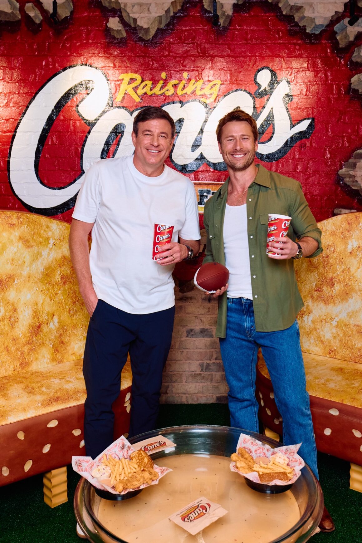 Glen Powell and Raising Cane’s owner and founder, Todd Graves