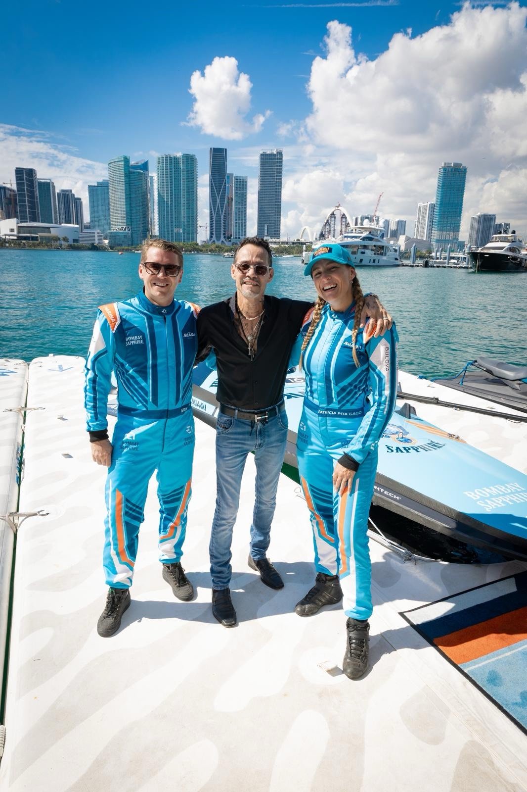 Erik Stark, Marc Anthony, and Anna Glennon