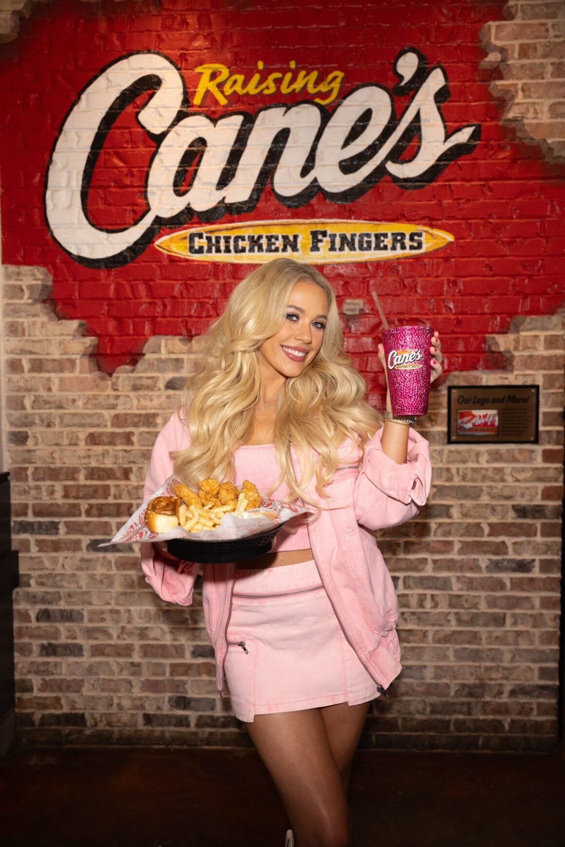 Country Music Superstar Megan Moroney Hosts "Pop Up" With Todd Graves At Raising Cane's Athens