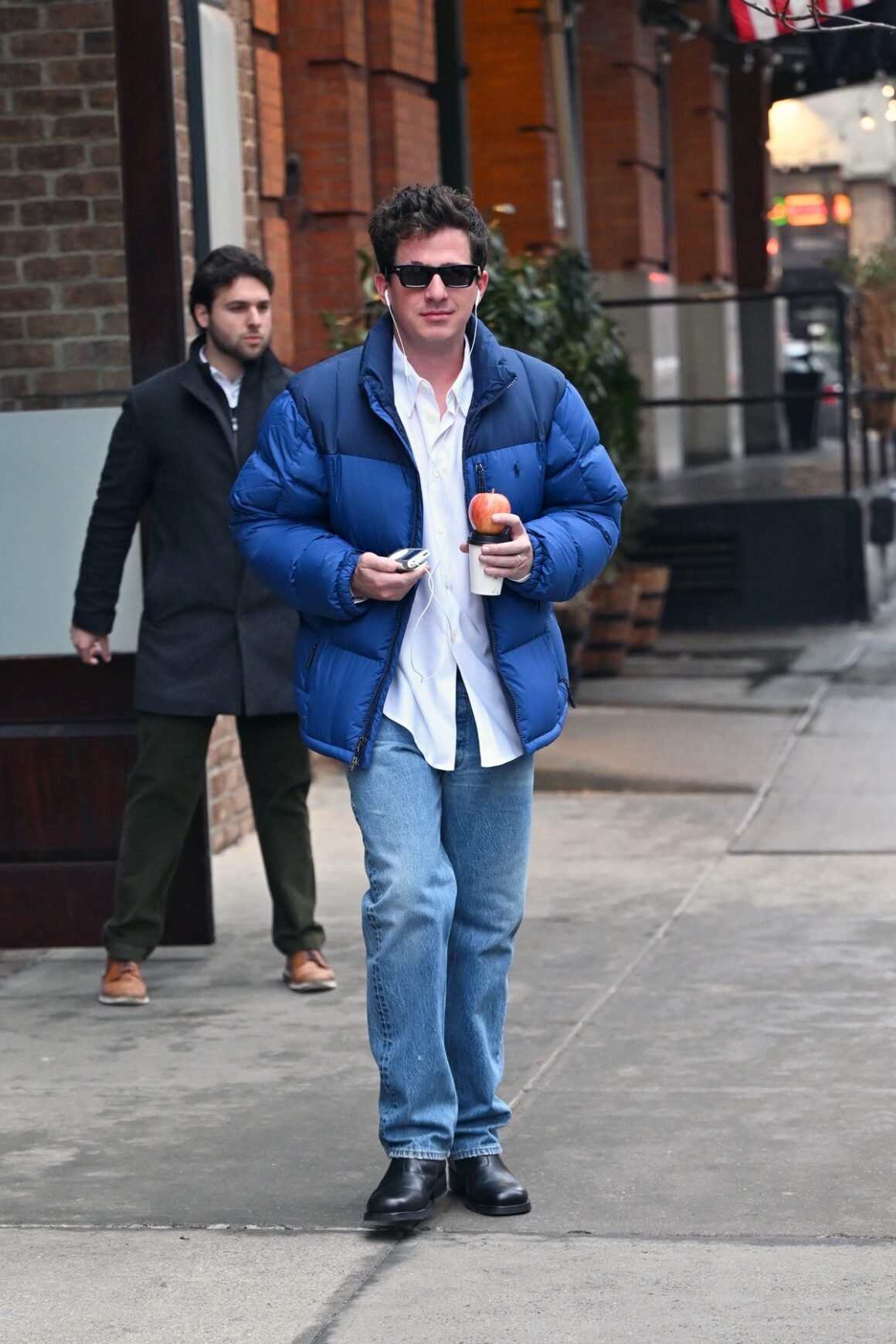 Charlie Puth Leaves His Hotel In New York
