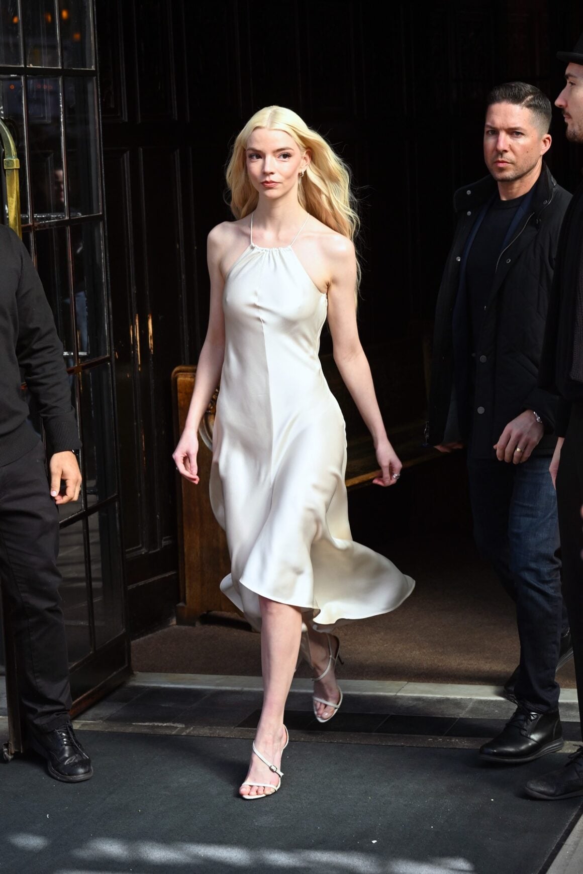 Anya Taylor Joy spotted leaving her New York City hotel wearing a white dress