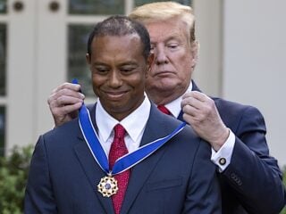 USA - 2019 - Presdient Donald Trump presents the Presidential Medal of Freedom to Tiger Woods at The White House Rose Garden in D.C.