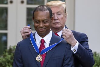 USA - 2019 - Presdient Donald Trump presents the Presidential Medal of Freedom to Tiger Woods at The White House Rose Garden in D.C.