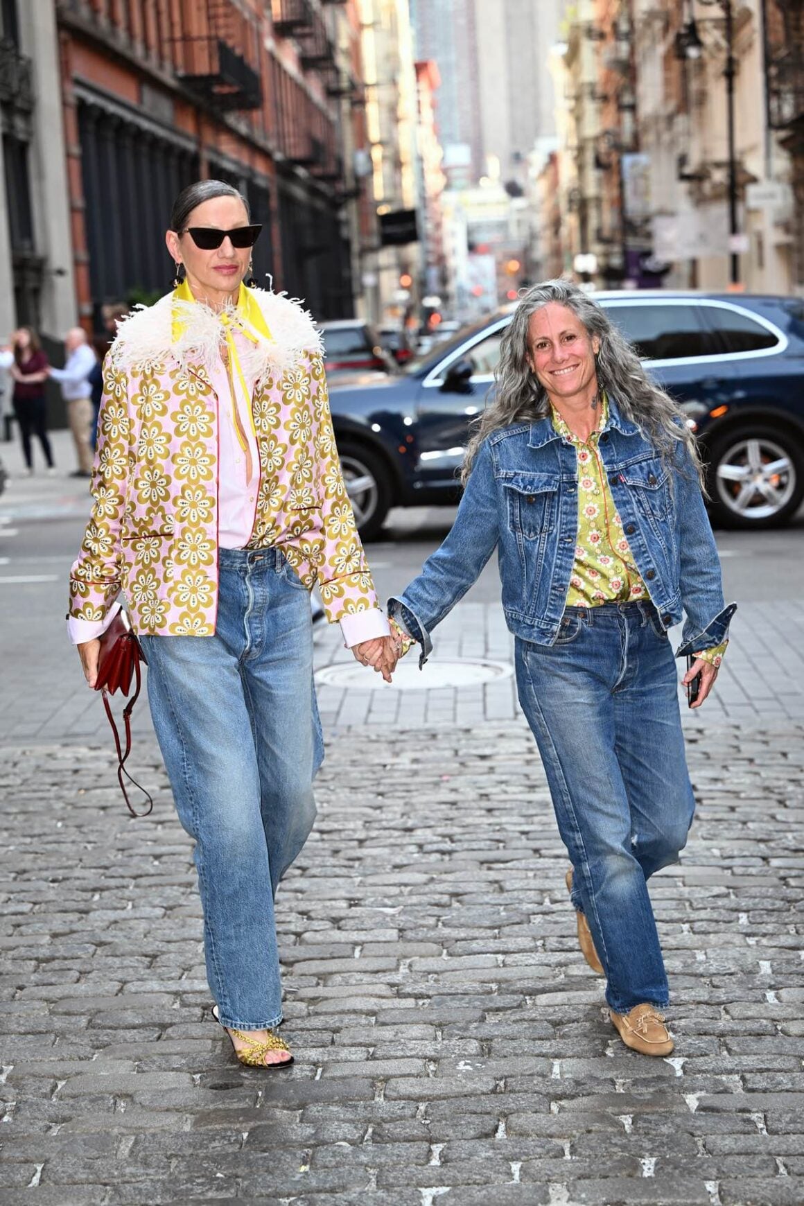 Jenna Lyons and her partner Cass Bird all smiles holding hands in Soho New York