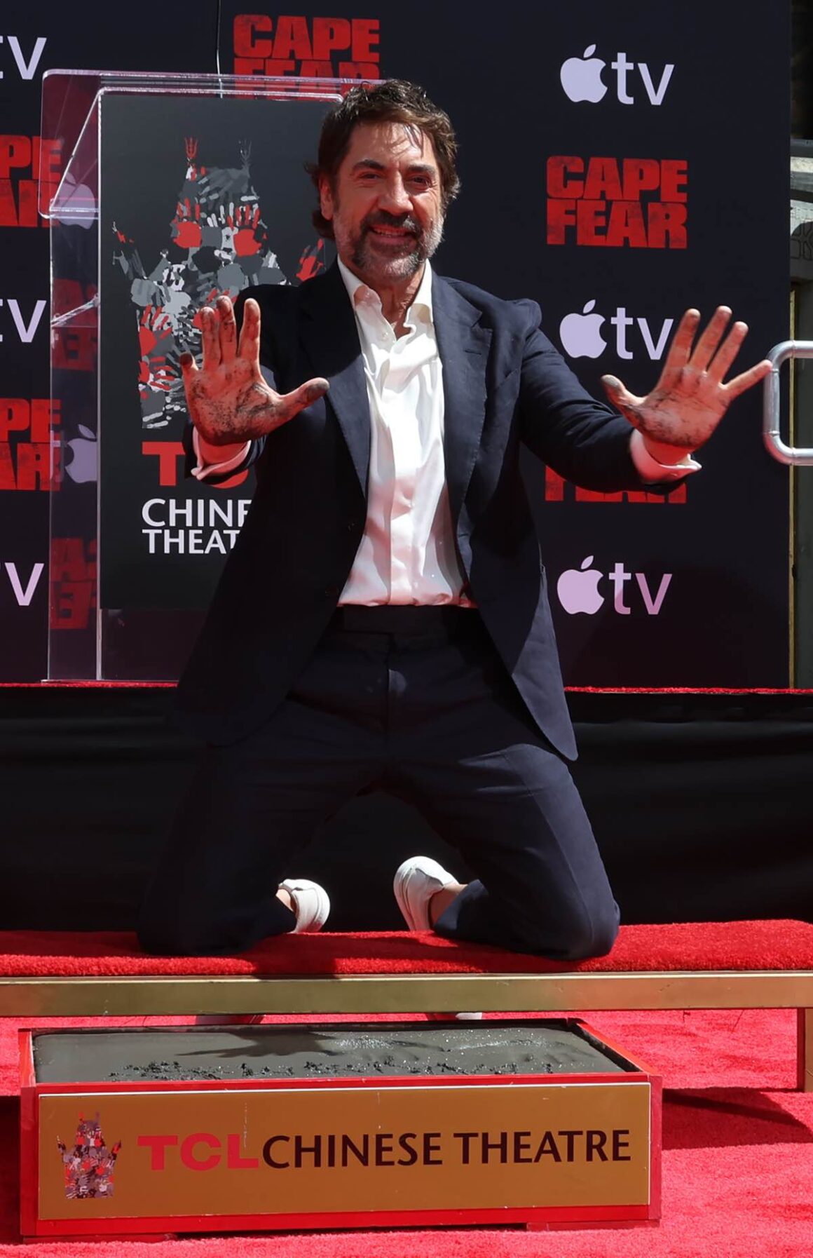 Celeb Snaps: Angelina Jolie Promotes Cotoure, Plus Taylor Swift, Will Poulter, Tom Holland, Zendaya, and More 12 Javier Bardem hand and footprint ceremony