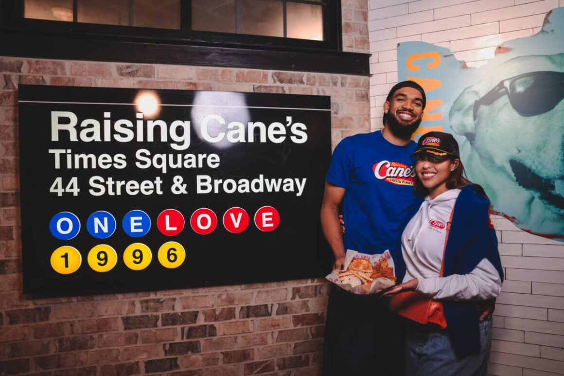 Basketball Champion Karl-Athony Towns Works Victory "Shift" At Raising Cane's Global Flagship In Times Square