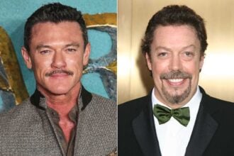 Luke Evans and Tim Curry