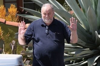 Meghan Markle's father Thomas Markle drops off flowers at Meghan's mother Doria Ragland home days before the wedding